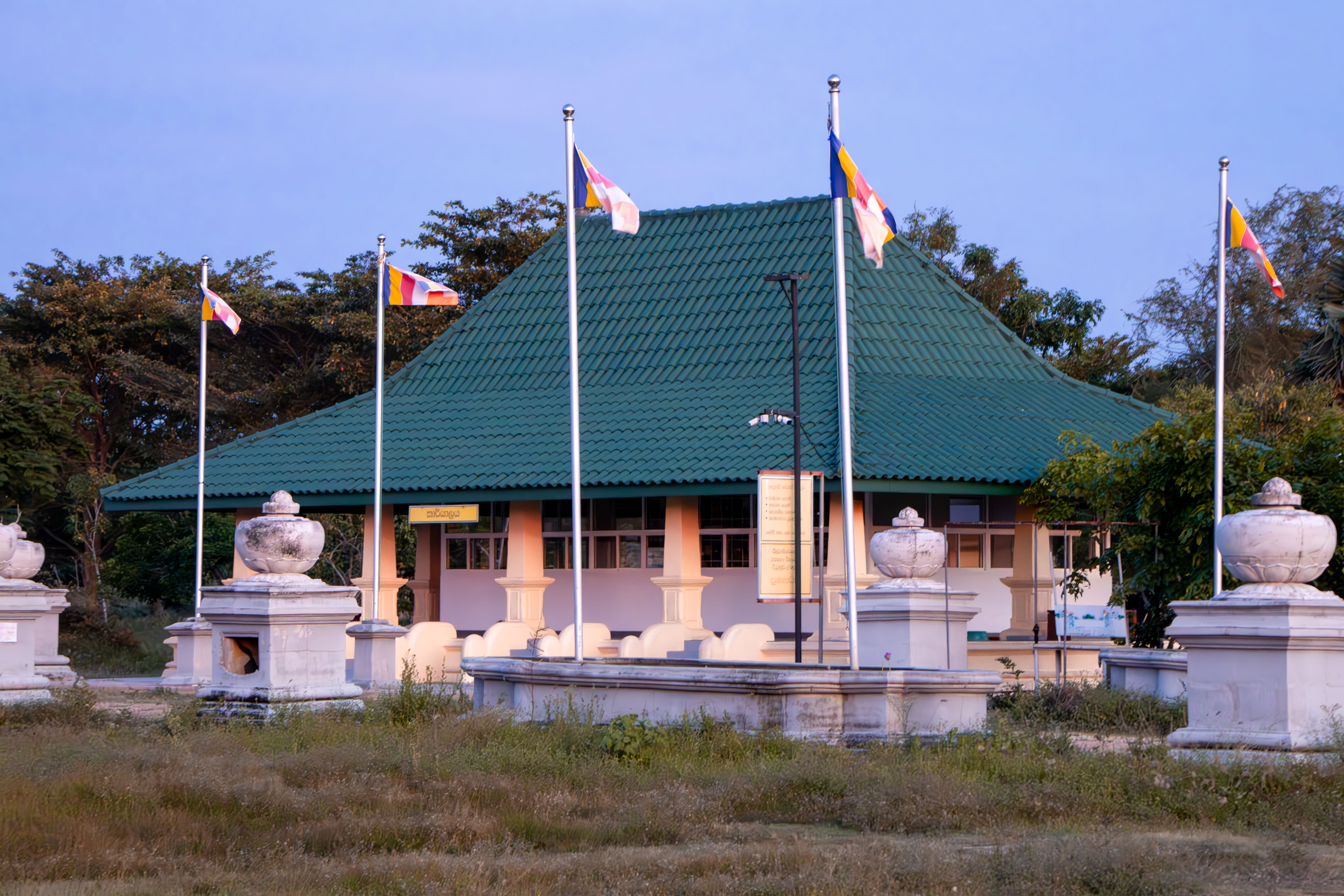Captivating dusk view of a Buddhist temple in Seruwawila, Sri Lanka.