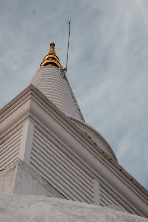 Free A striking low angle view of the sacred Seruwawila Stupa with a golden pinnacle in Sri Lanka. Stock Photo
