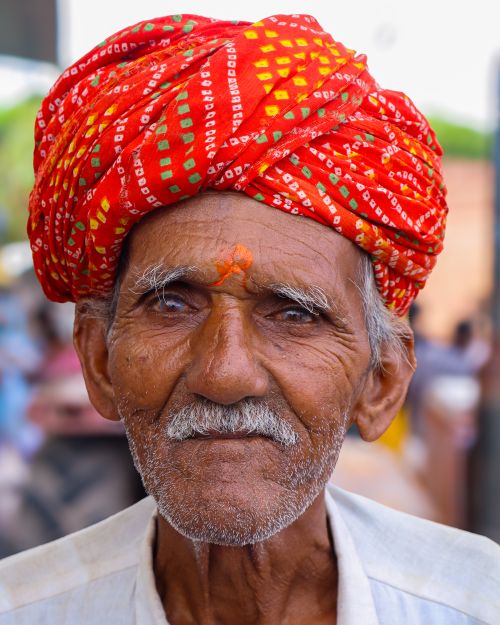 Free Authentic portrait of a Rajasthani elder in a colorful turban, showcasing cultural heritage. Stock Photo