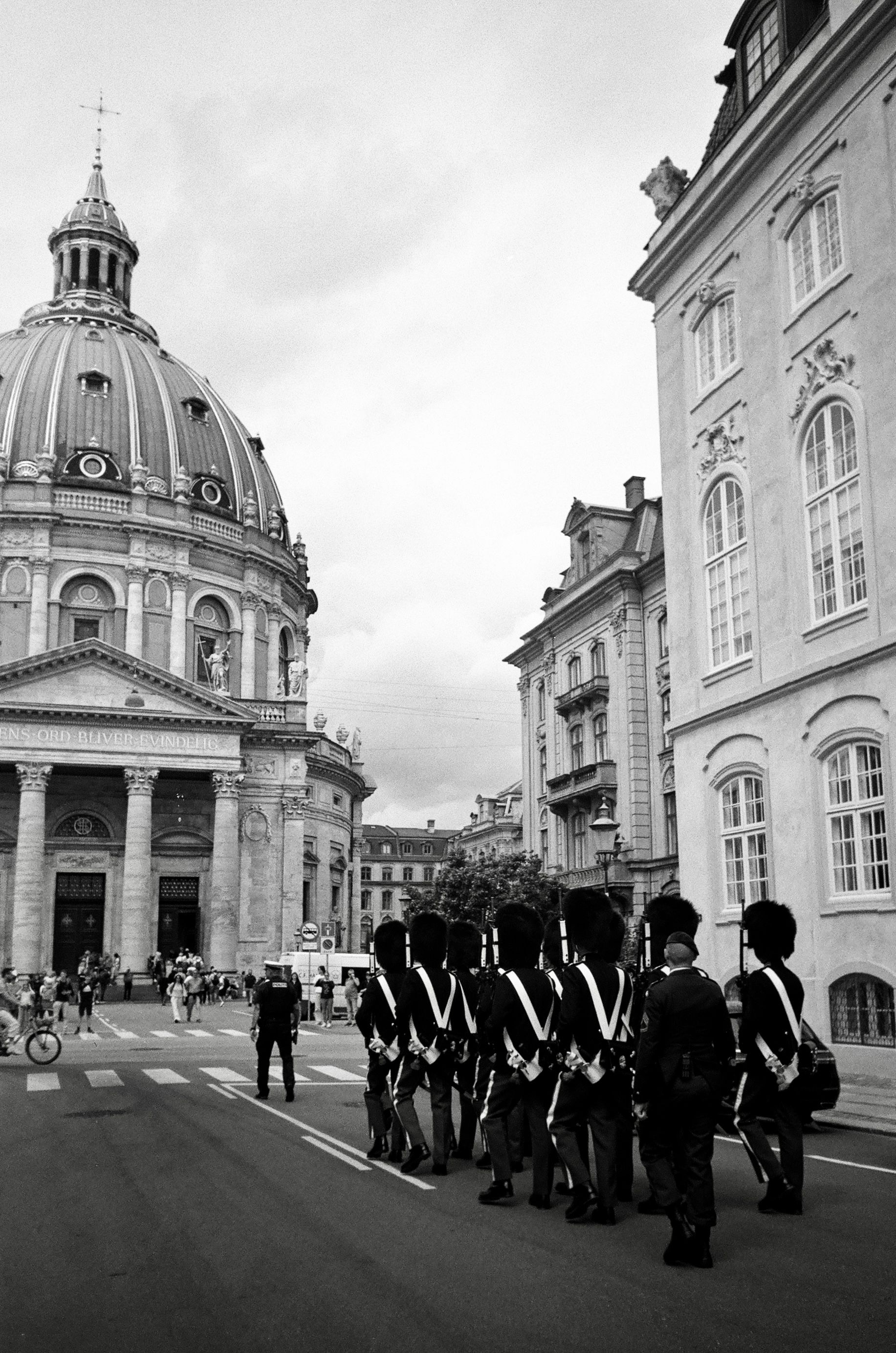 Royal Guards marching in front of the majestic Frederiks Church in Copenhagen.