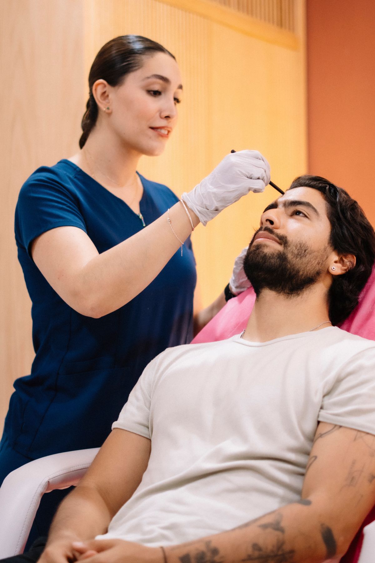 Male client receiving a specialist aesthetic salon treatment