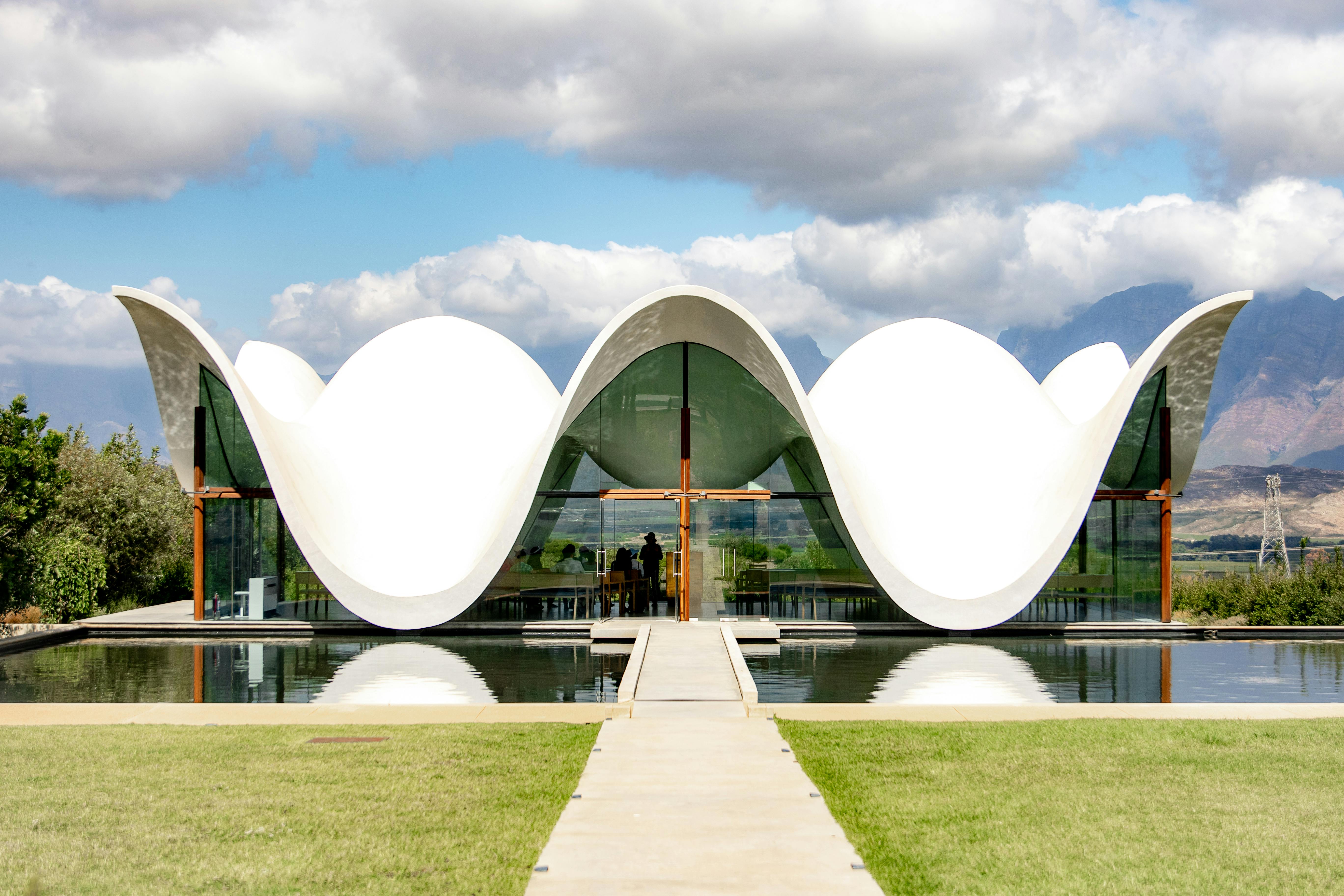 Explore the stunning modern architecture of Bosjes Chapel set in the serene landscape of South Africa.