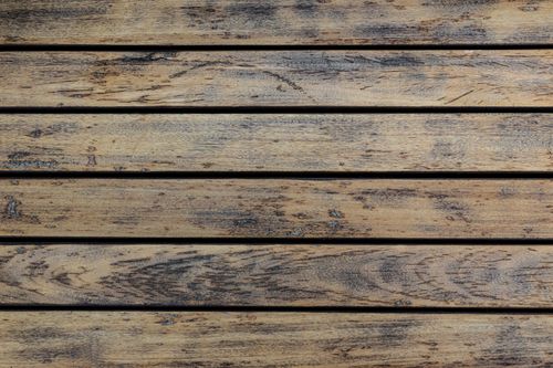Free High-resolution image of a rustic wooden floor texture with natural grains and earthy tones. Stock Photo