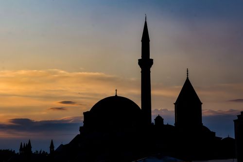 Free Dramatic skyline silhouette of a mosque at sunset, emphasizing cultural architecture. Stock Photo