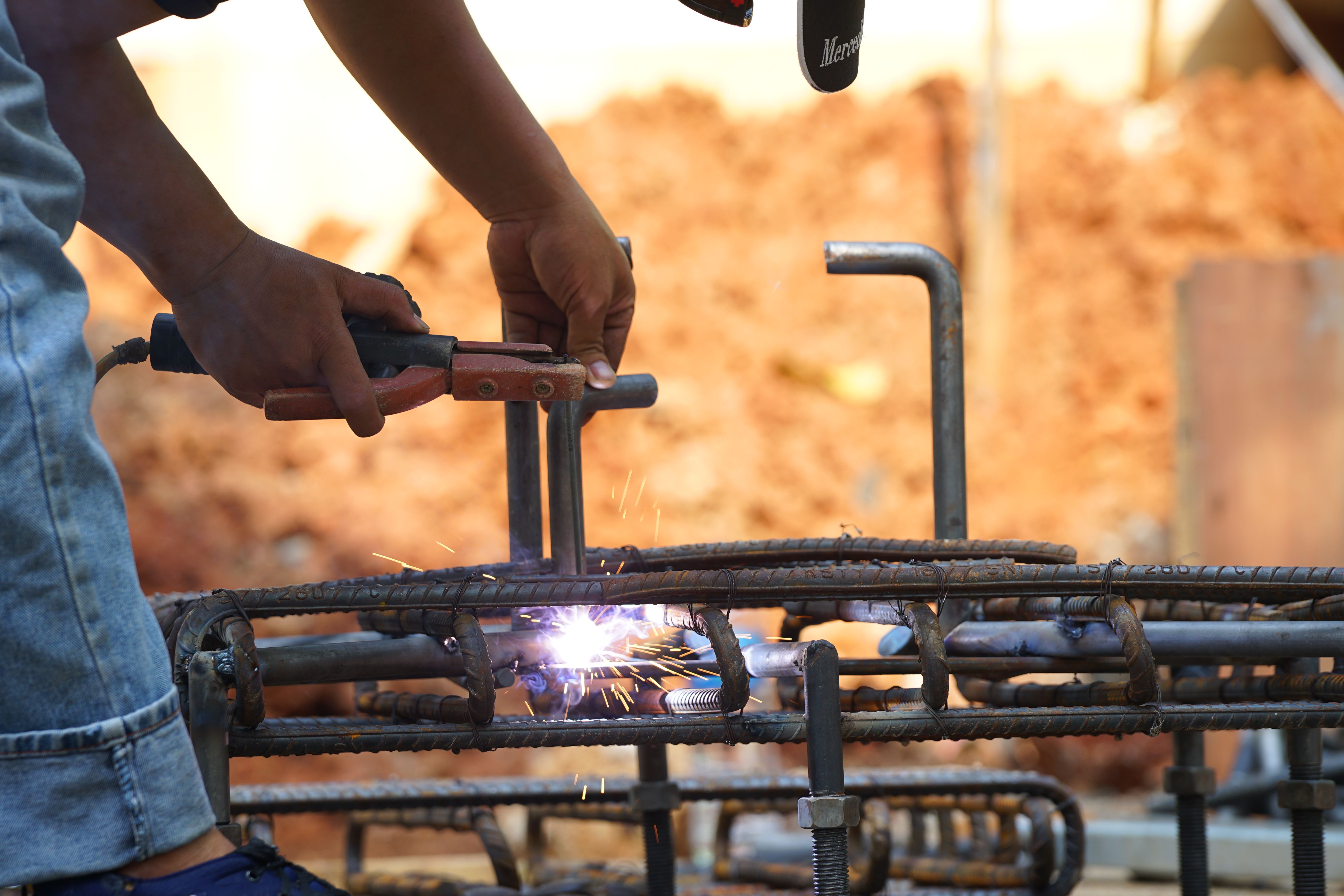 mechanical rebar coupler installation showing continuous reinforcement