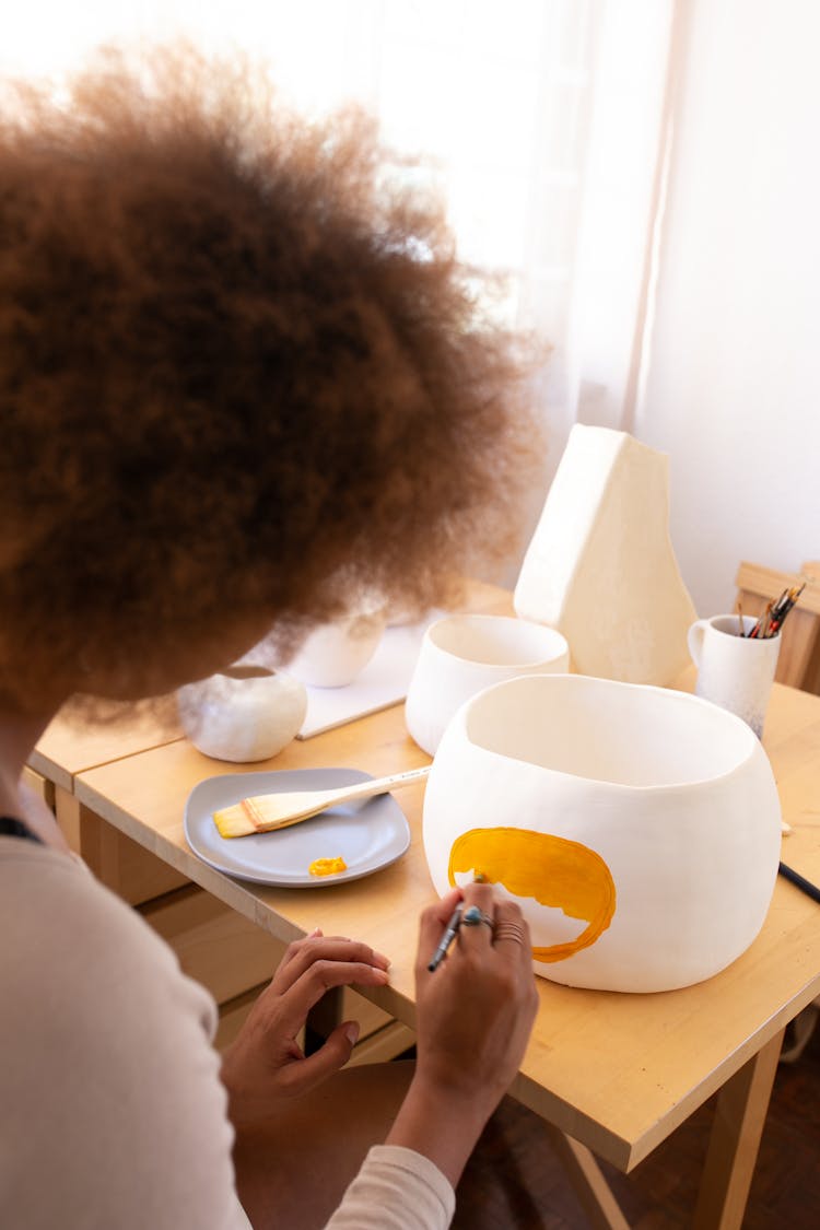 Creative Black Craftswoman Paining Picture On Handmade Pottery