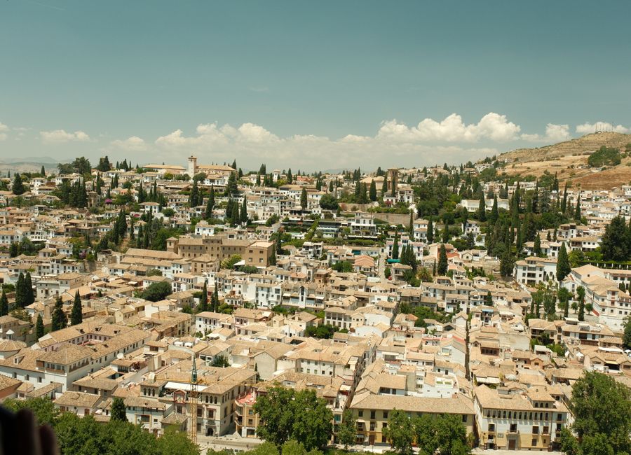 A stunning aerial view of Granada's historic Albayzín district with its distinctive Islamic architecture.