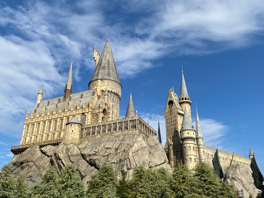 Hogwarts Castle rising above the Wizarding World of Harry Potter at Universal Studios Japan