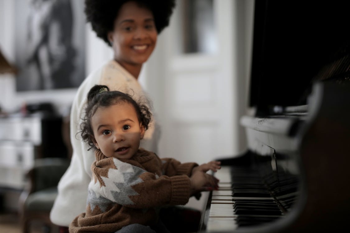 Free Photo of Toddler Playing Piano Stock Photo