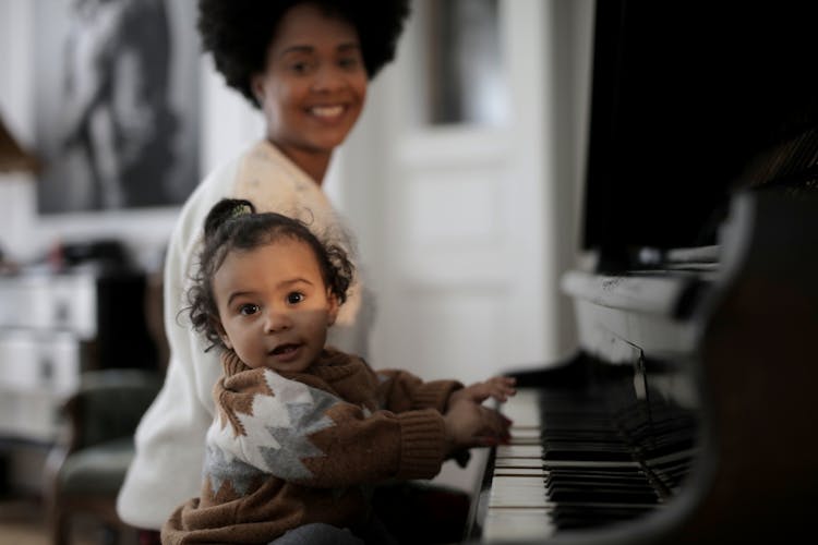 Photo Of Toddler Playing Piano