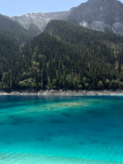 Free Stunning turquoise lake with lush mountains in Jiuzhaigou National Park, perfect for nature enthusiasts. Stock Photo