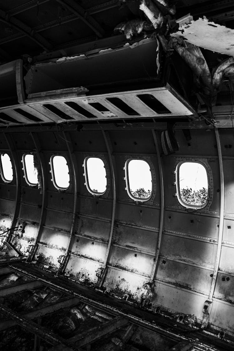 Interior Of Old Crushed Airplane With Many Windows