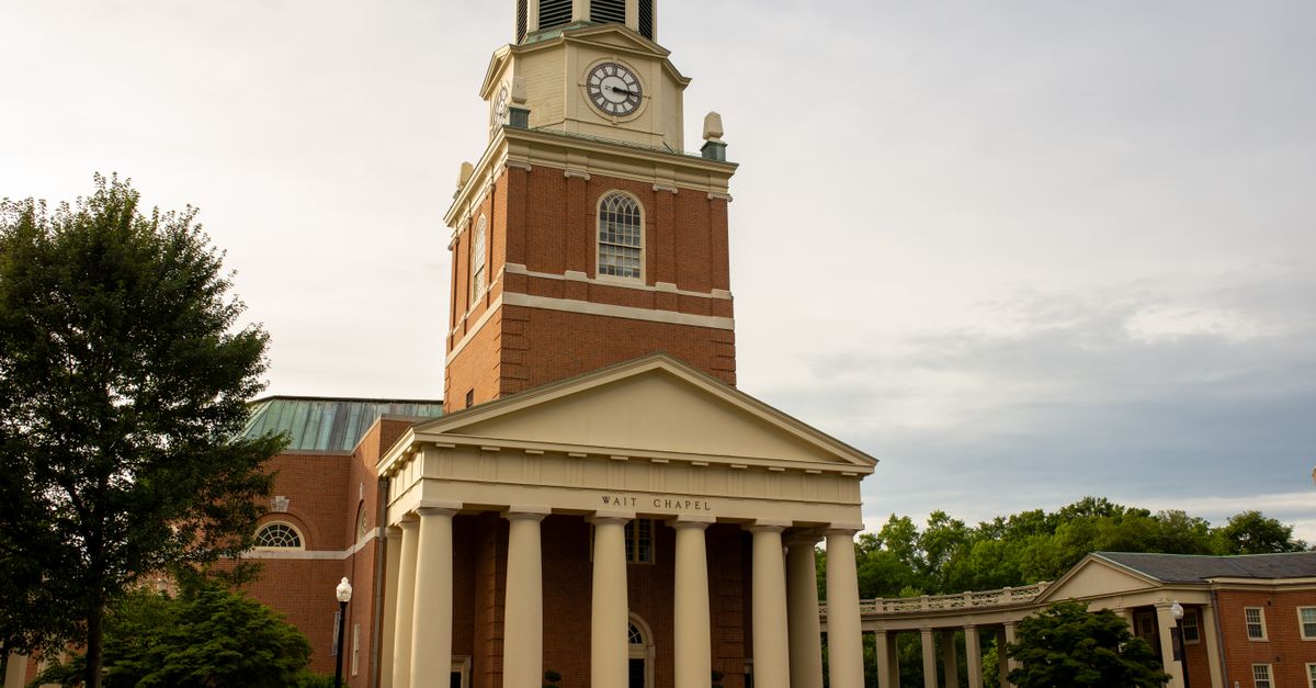 Elegant and historic Wait Chapel at Wake Forest University under a cloudy sky.