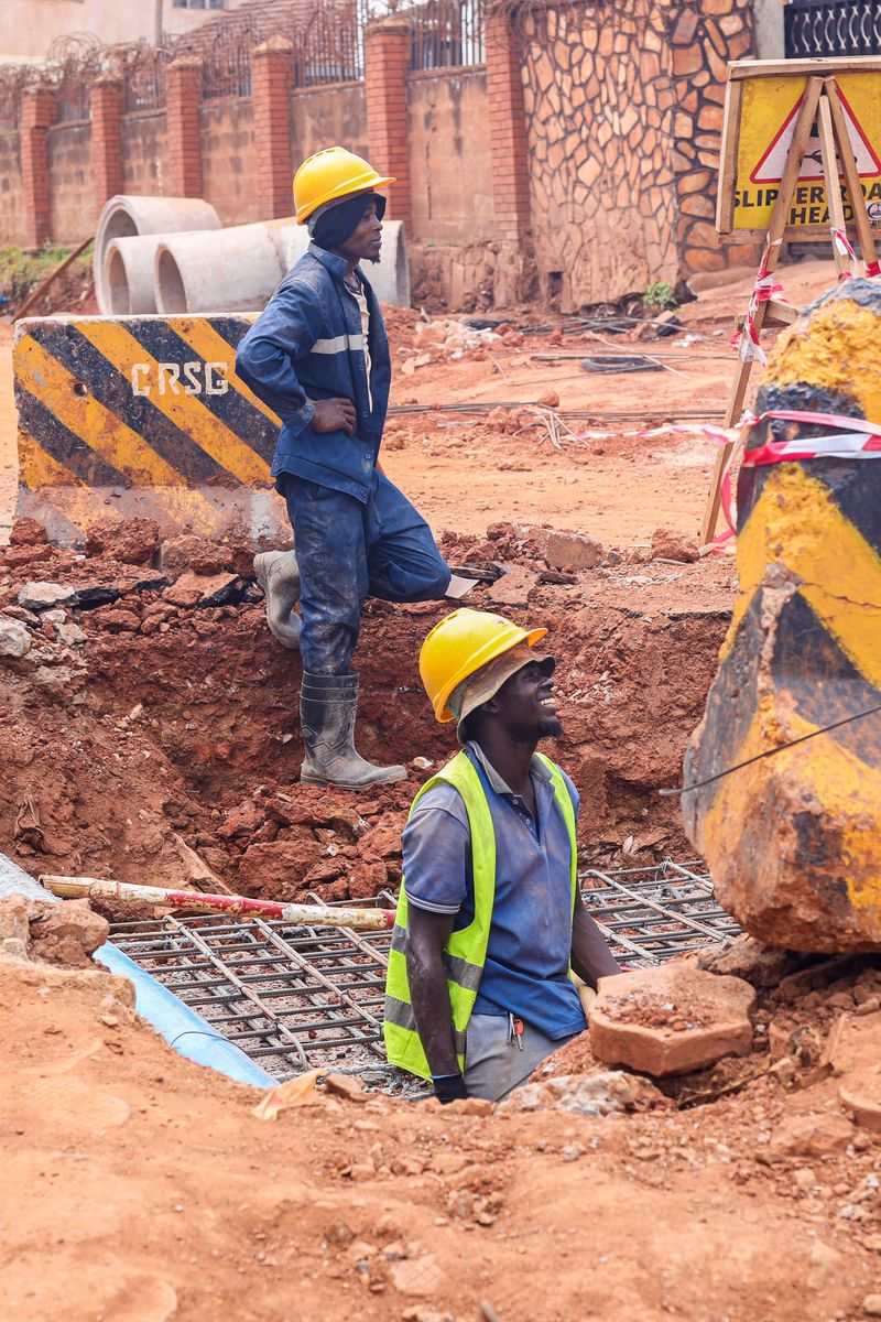 Workers at a site in Kampala, Uganda, representing operational support