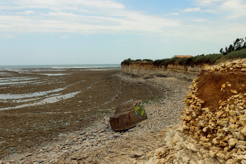 Explore the rugged coastal cliffs and rocky shoreline in Nouvelle-Aquitaine, France.