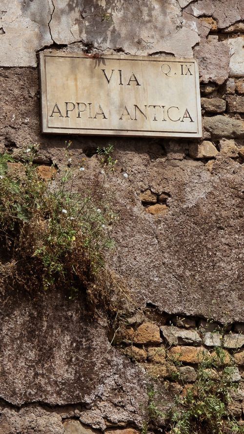 Free A vintage street sign for Via Appia Antica on a rustic stone wall in Rome, Italy. Stock Photo