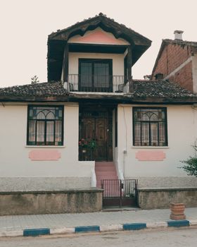Traditional Turkish house with decorative windows in Pazaryeri, ideal for cultural and architectural themes.