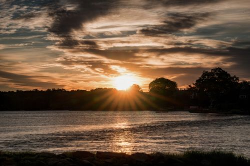 Free Serene sunrise over Cove Island Park in Stamford, Connecticut capturing a peaceful morning scene. Stock Photo