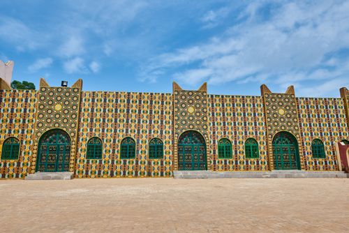 Free Vibrant facade of the Emir's Palace with traditional patterns in Dutse, Nigeria. Stock Photo