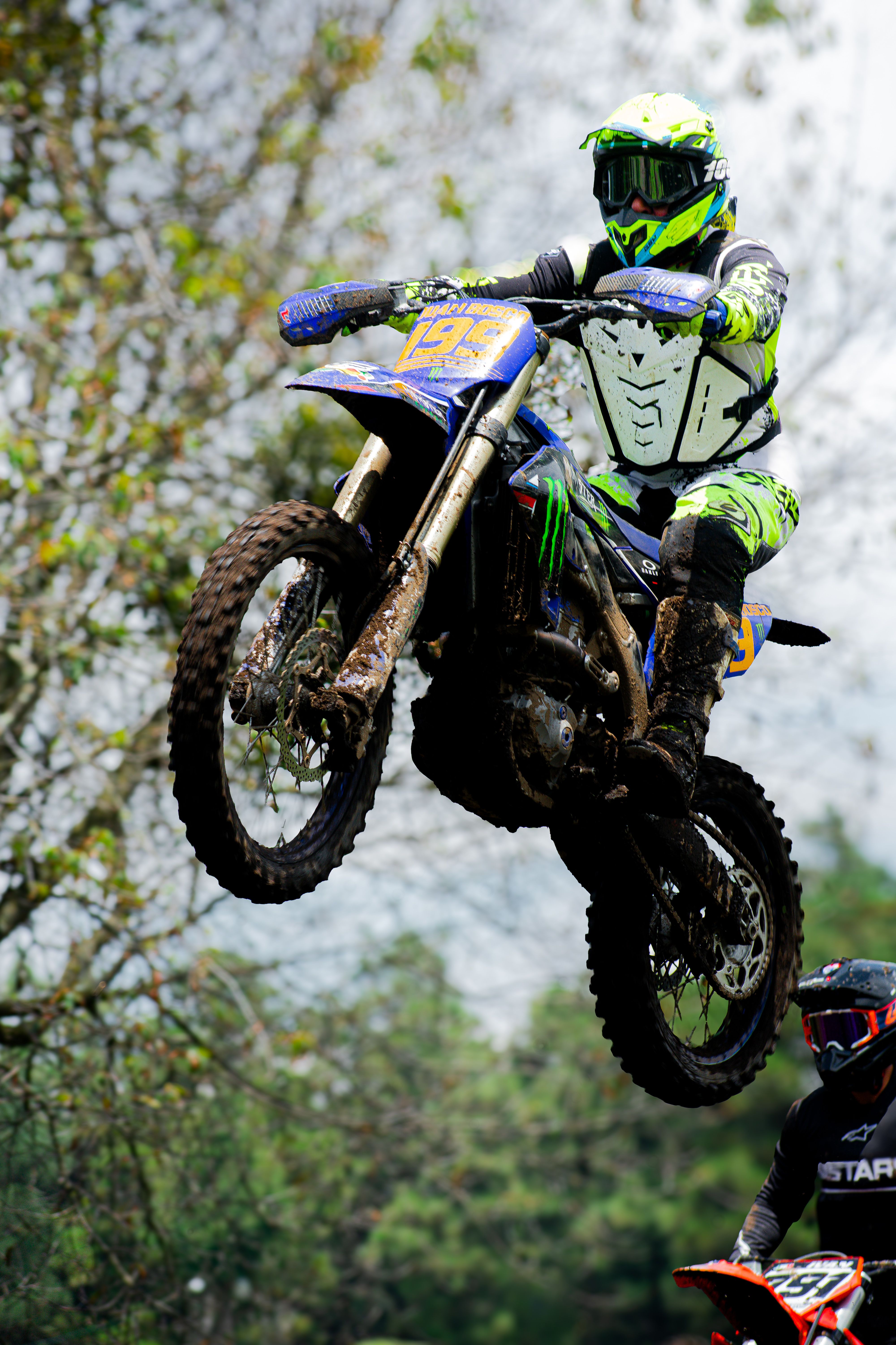 Thrilling motocross race in Mexico City showcasing high-speed jumps and skilled riders.