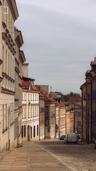 Explore the historic charm of a Warsaw street lined with classic European architecture.