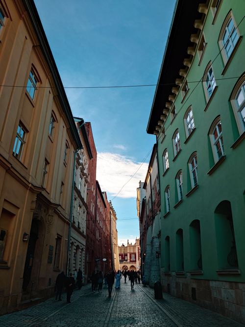 Free Discover the colorful architecture and vibrant street life of Kraków's historic center in Poland. Stock Photo
