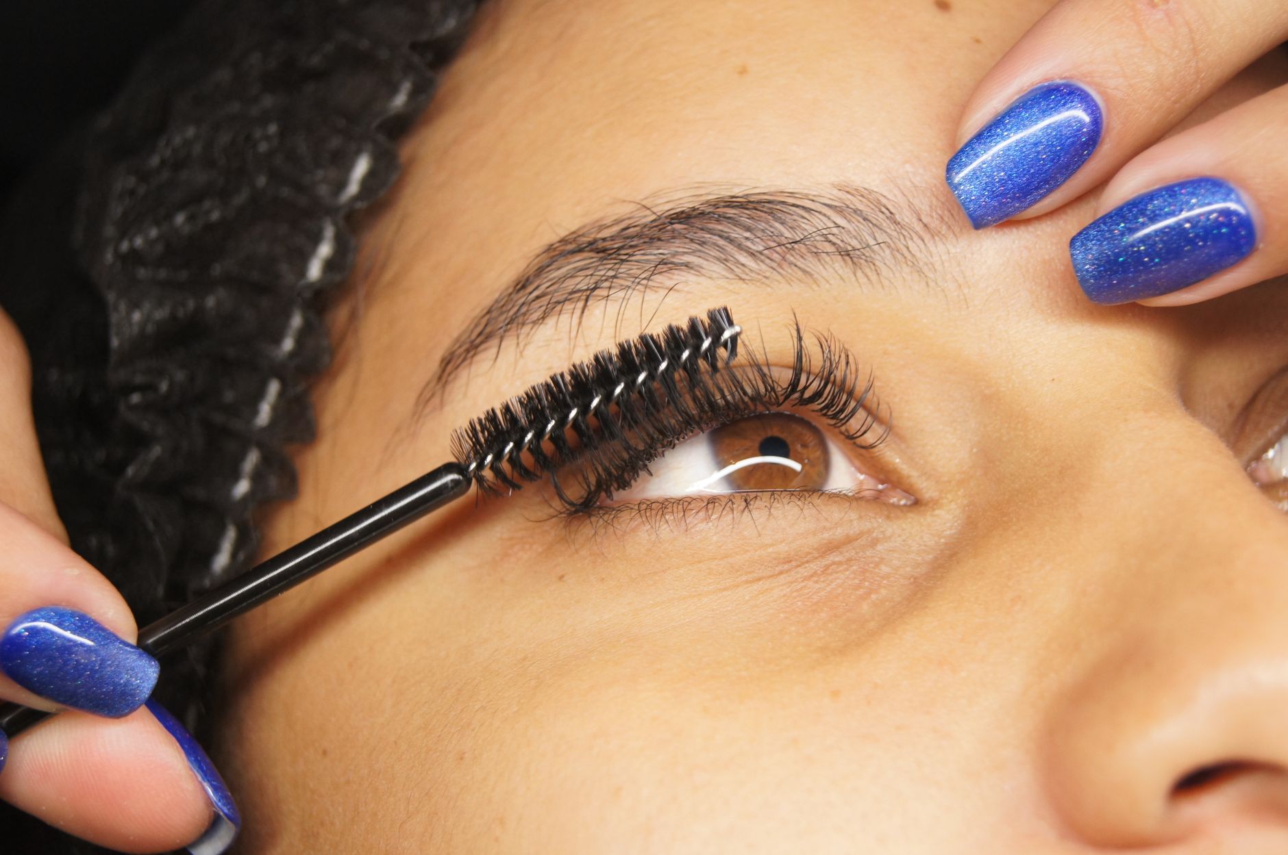 10 Brilliant Makeup for Hair Extensions Tips to Enhance 4 Applying makeup for hair extensions with precision to protect hair health.