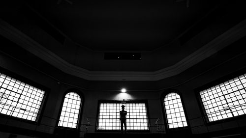 Free Black and white photo of a silhouette inside a historic building in Ushuaia, Argentina. Stock Photo