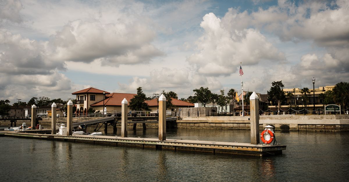 Serene dock scene in St. Augustine, Florida, depicting calm waters and a picturesque marina.