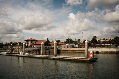 Free Serene dock scene in St. Augustine, Florida, depicting calm waters and a picturesque marina. Stock Photo