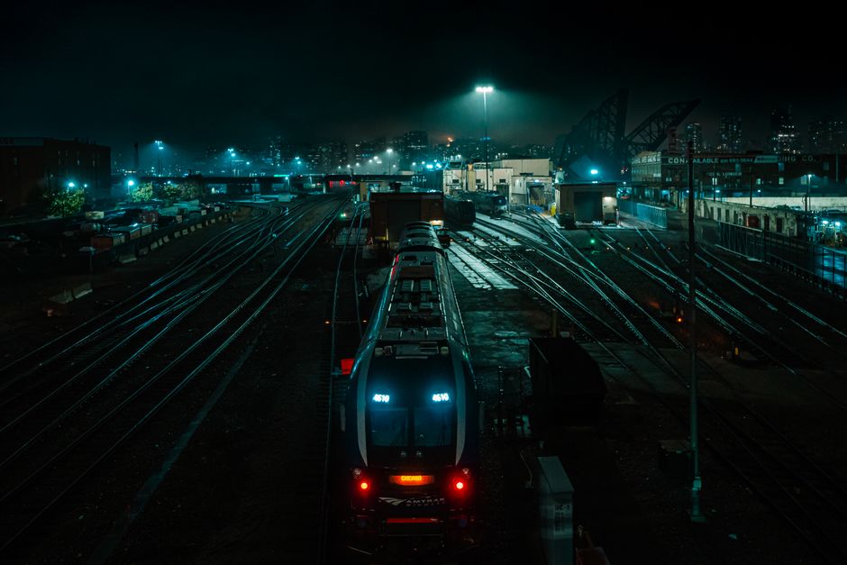 An Amtrak Acela Express train speeding through the countryside in the USA