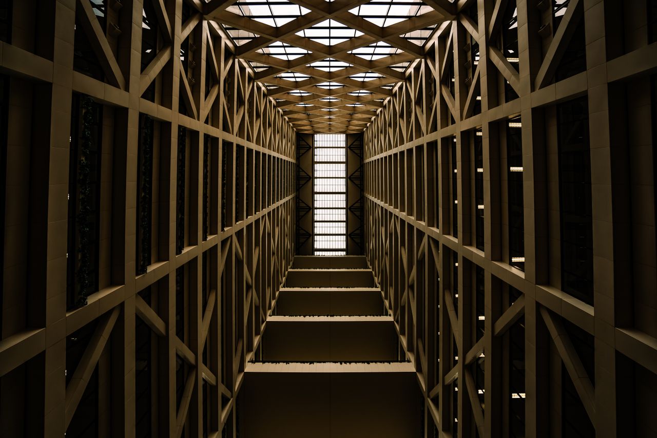 symmetrical perspective of a modern building s interior structure in m