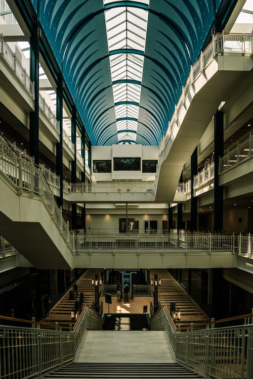 Free Interior view of a modern atrium with geometric ceiling and walkways in Minneapolis. Stock Photo