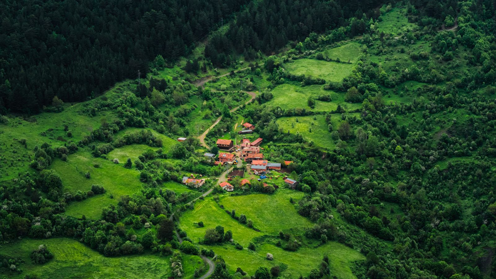 Rural village in verdant valley, Equatorial Guinea