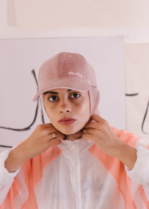 Photo of Woman Wearing Pink Cap