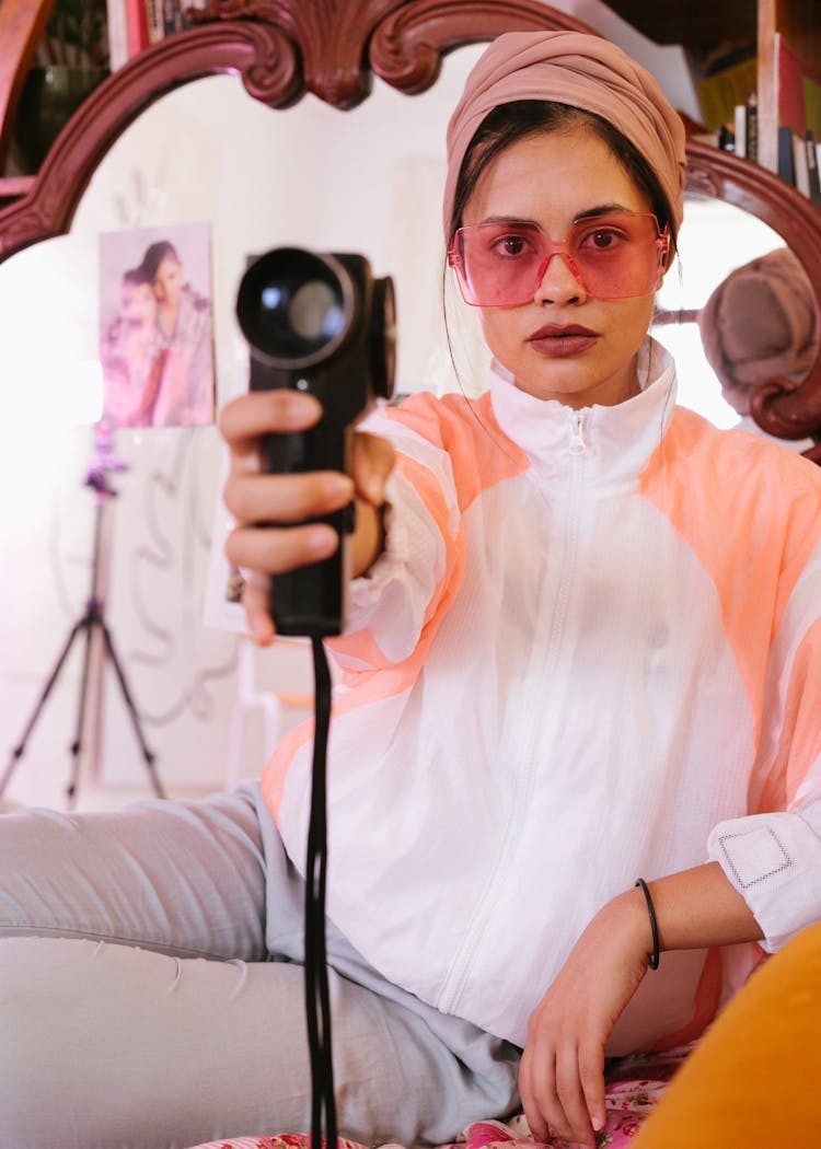 Young Trendy Woman With Retro Photo Camera In Flat