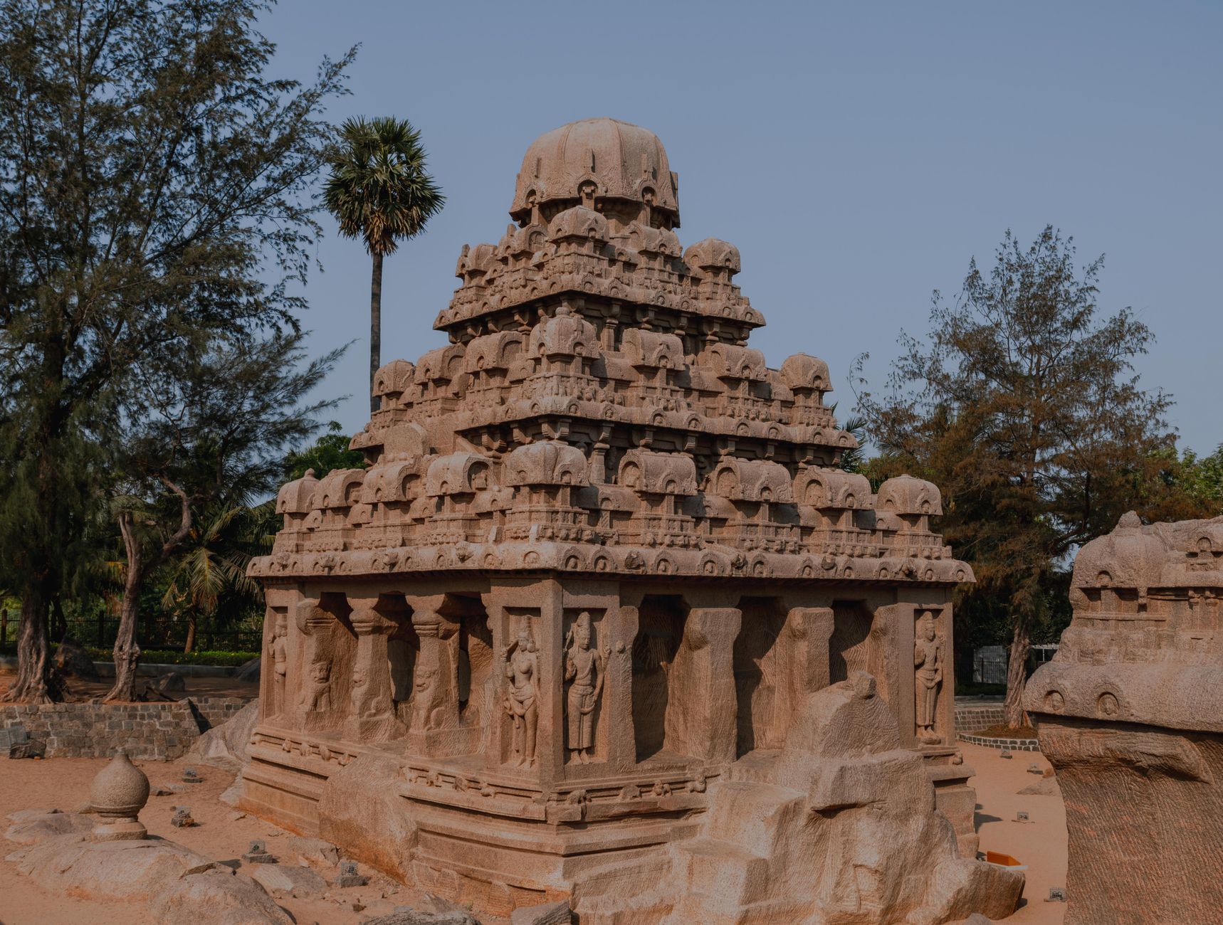 Intricate stone temple architecture in Mahabalipuram, showcasing ancient Indian craftsmanship.