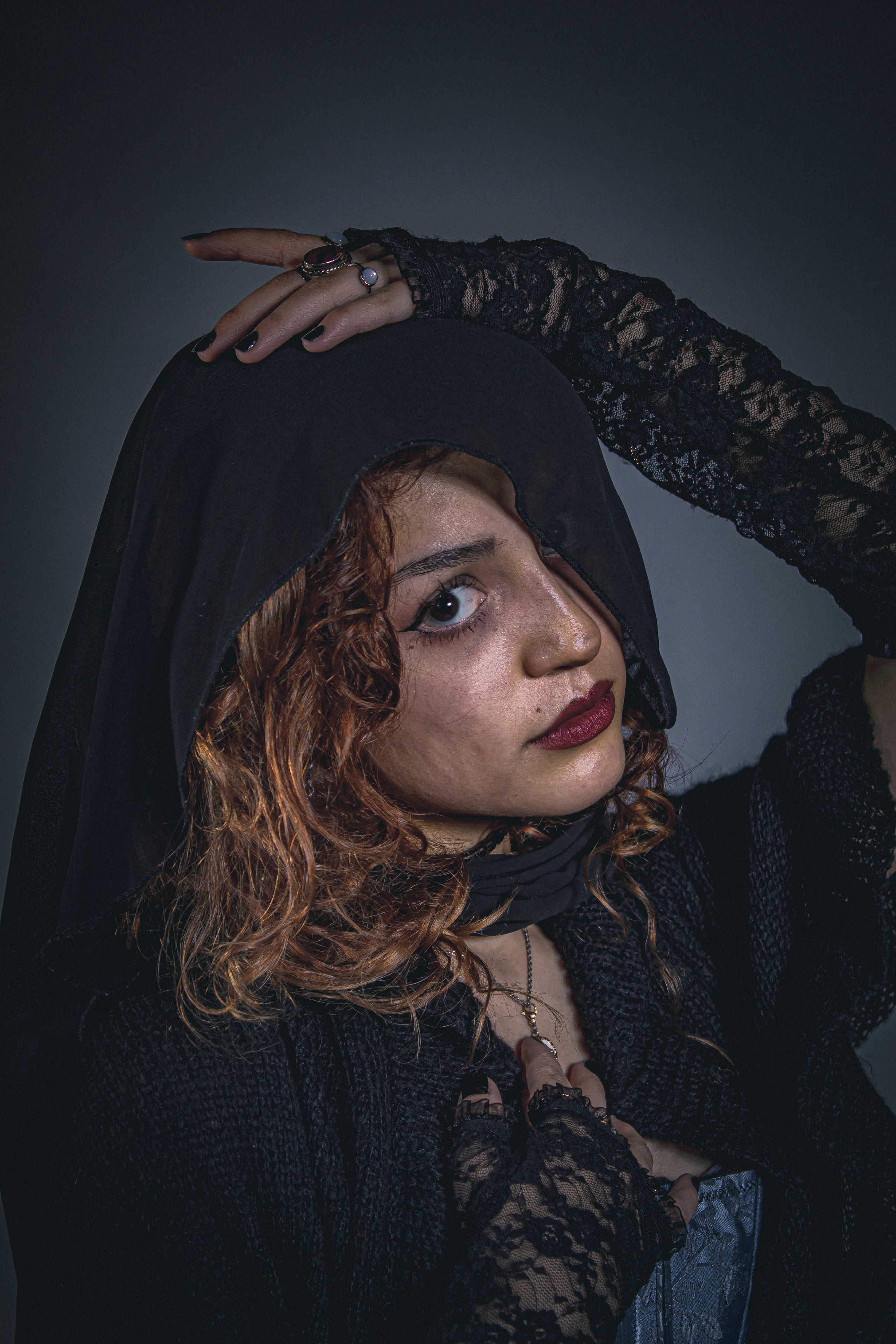 Dramatic portrait of a woman in lace and veil, exuding Victorian elegance.. dramatic, portrait, woman
