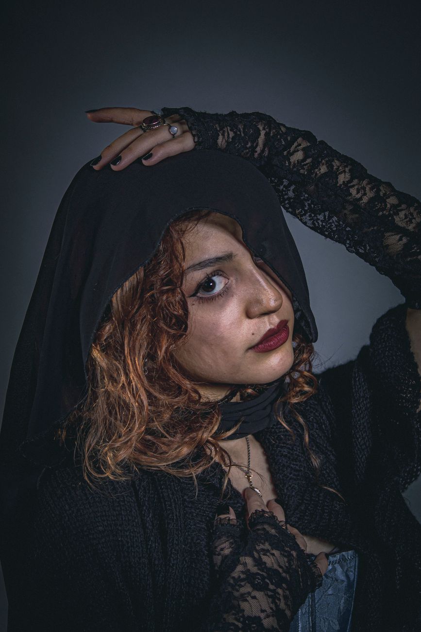 Dramatic portrait of a woman in lace and veil, exuding Victorian elegance.. dramatic, portrait, woman