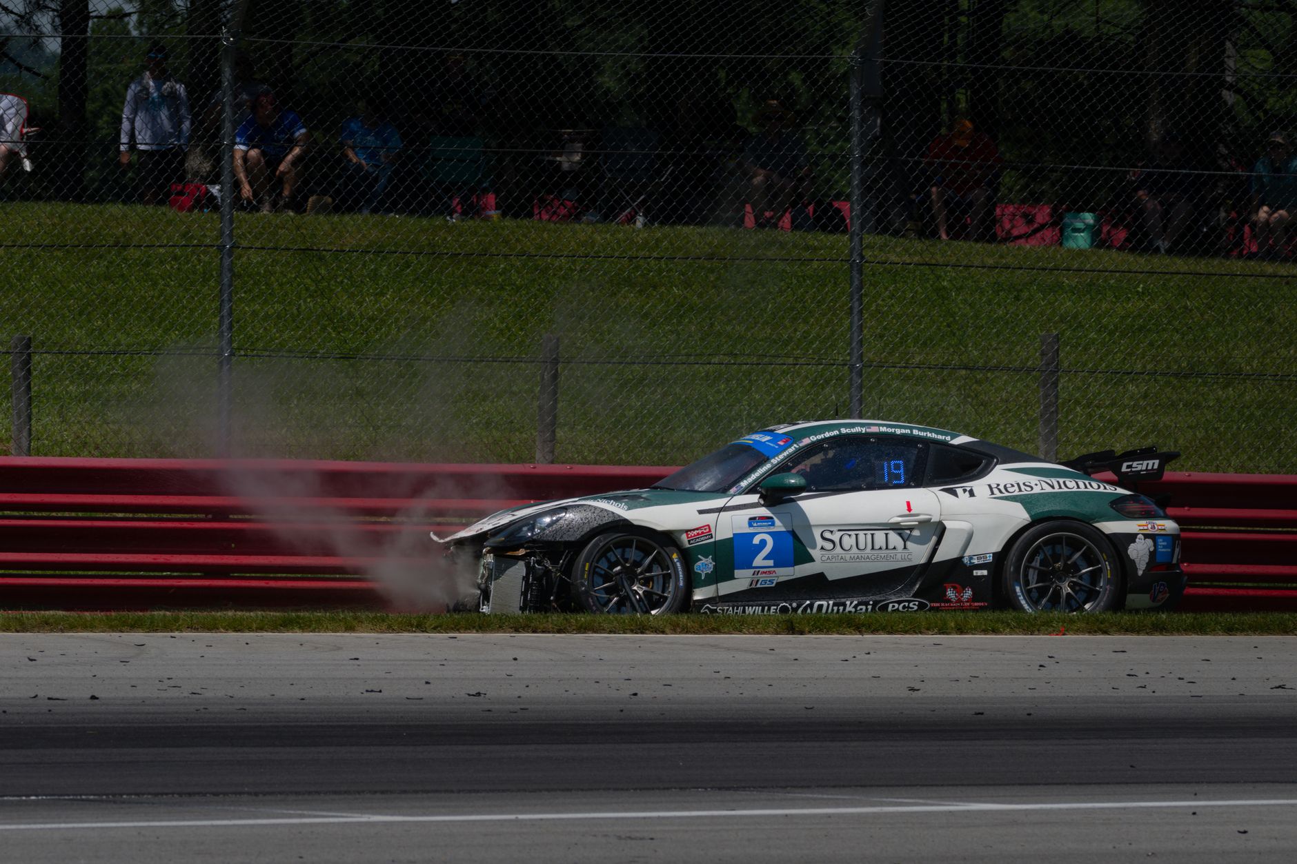 A damaged race car after crashing into barriers at a racing event in Lexington, Ohio.