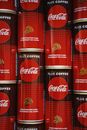 Piled Coca Cola Canned Sodas