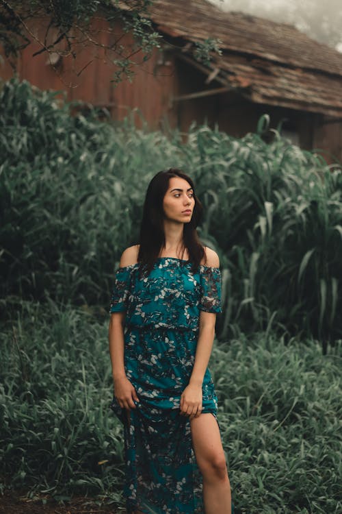 Woman in Green Floral Off Shoulder Dress