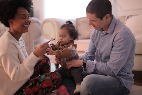 Free Photo of Woman Feeding Her Child Stock Photo