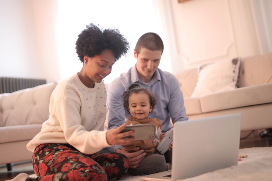 family using modern electronics safely in their living room - electrical system replacement in moseley, va family using modern electronics safely in their living room - electrical system replacement in moseley, va