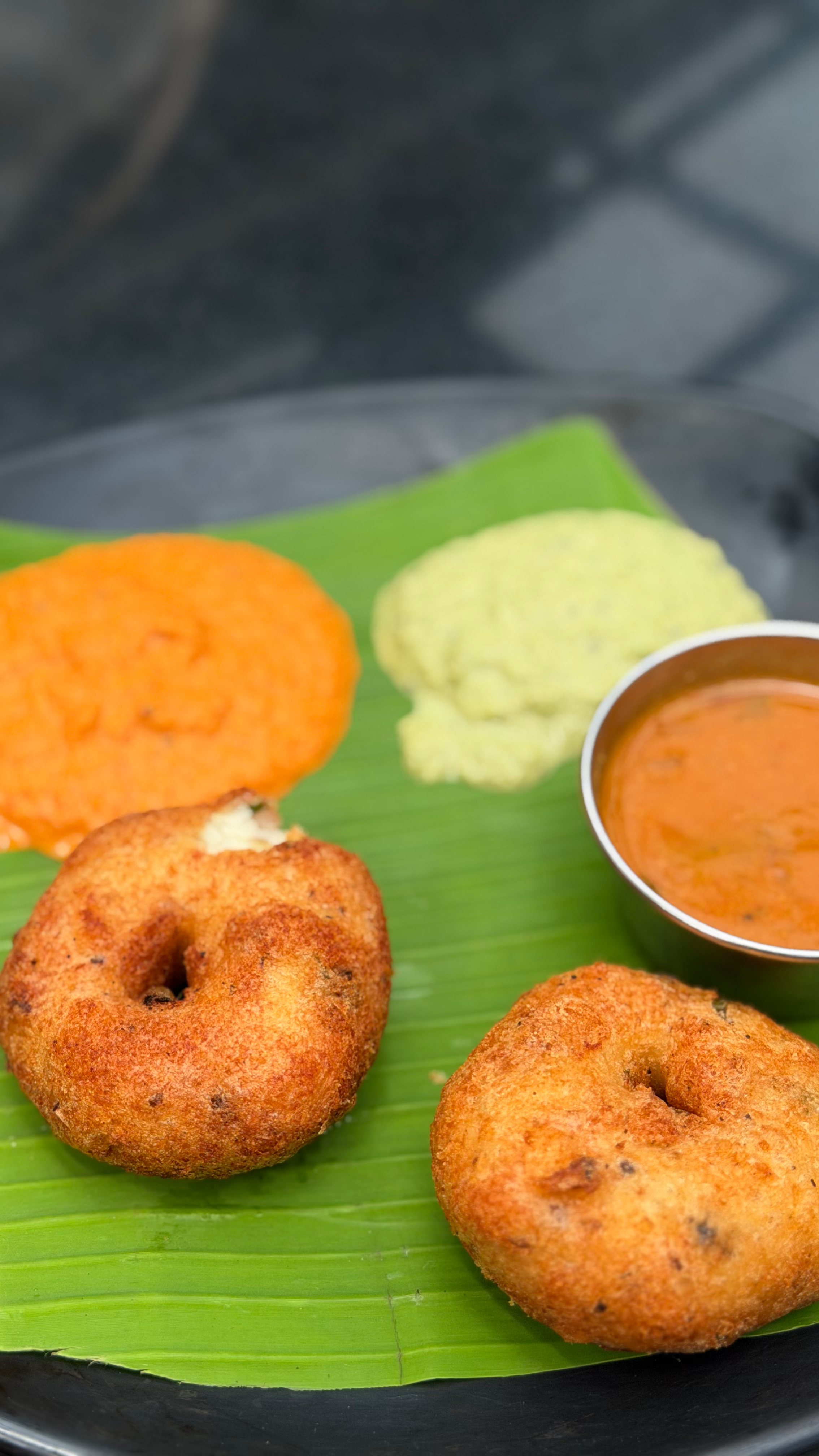 Medu vadai served with coconut chutney and sambar