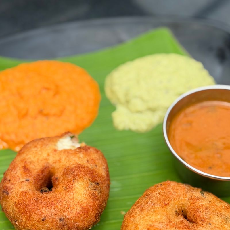 Medu vadai served with coconut chutney and sambar