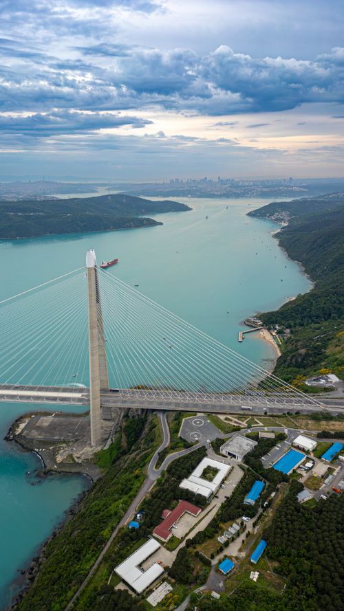 Free A scenic aerial view of the Yavuz Sultan Selim Bridge spanning the Bosphorus Strait in Istanbul, Türkiye. Stock Photo
