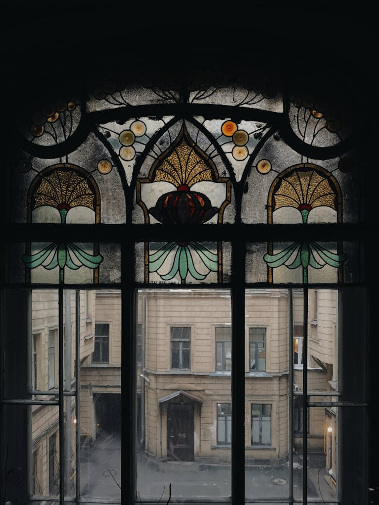 Window Fence Of Old Building Decorated With Mosaic