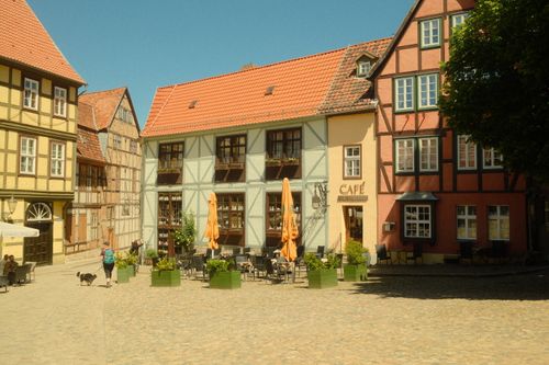 Free A picturesque view of traditional half-timbered buildings in Quedlinburg, Germany, on a sunny day. Stock Photo