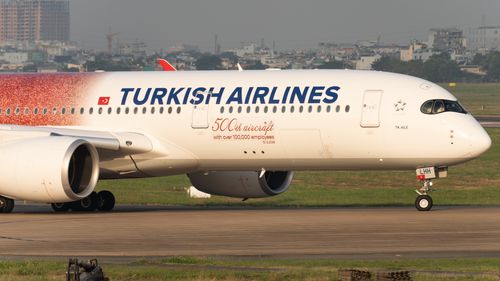 Free Turkish Airlines Airbus A350 preparing for takeoff at an airport. Stock Photo